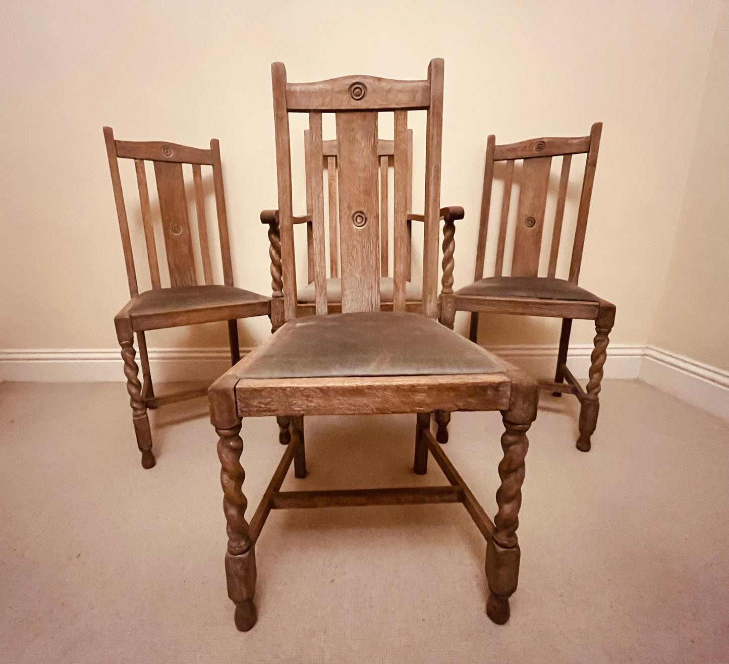 Set of 4 Vintage Oak Dining Chairs – Barley Twist Legs, Carved Backs and Padded Seats (c.1930–1945)