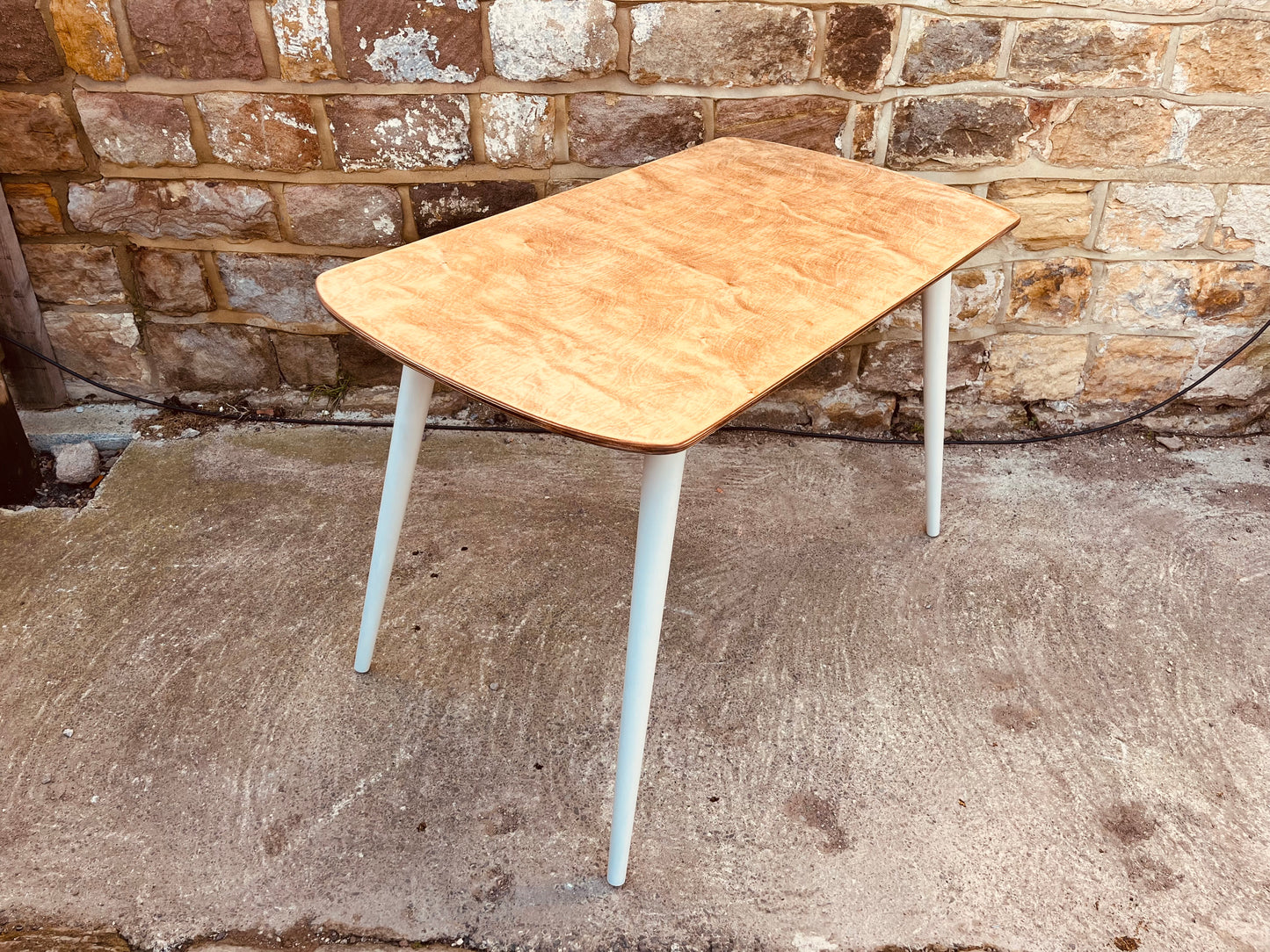 Mid-Century Style Dining Table with Veneered Top and Soft Neutral Legs