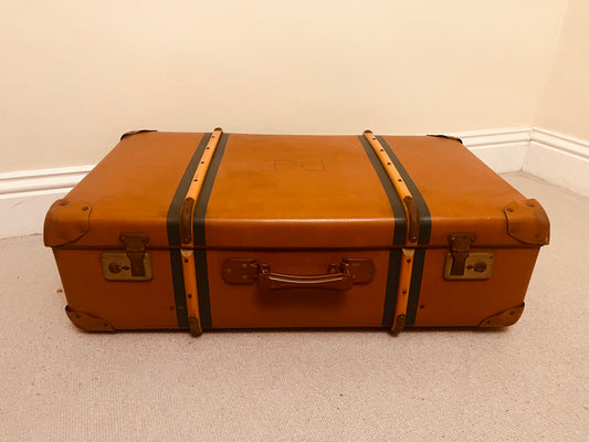 Pair of Vintage Travel Trunks – Tan Leather & Black Metal Storage Chests – Retro Luggage by The Proudlove Studio