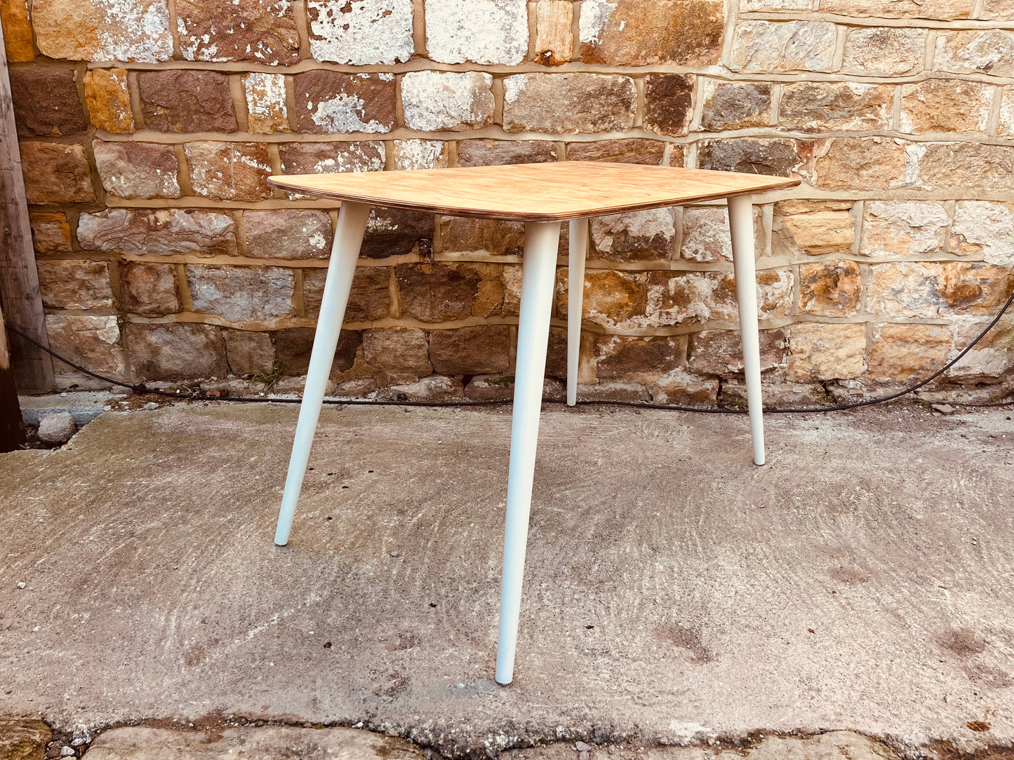 Mid-Century Style Dining Table with Veneered Top and Soft Neutral Legs