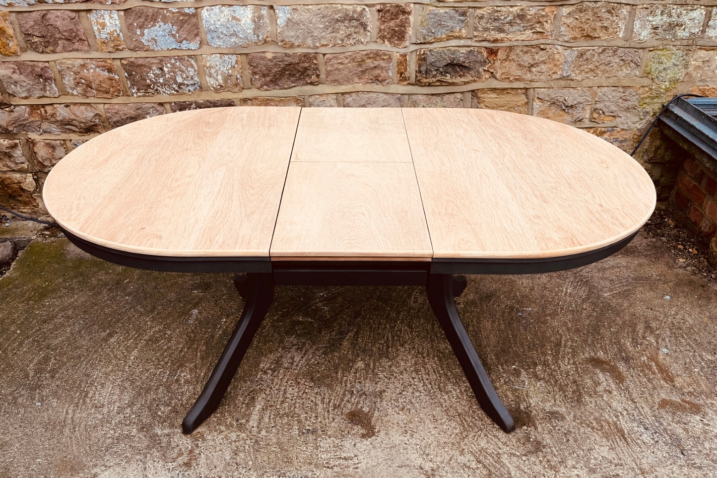 Solid Wood Extending Oval Dining Table with Dark Painted Base