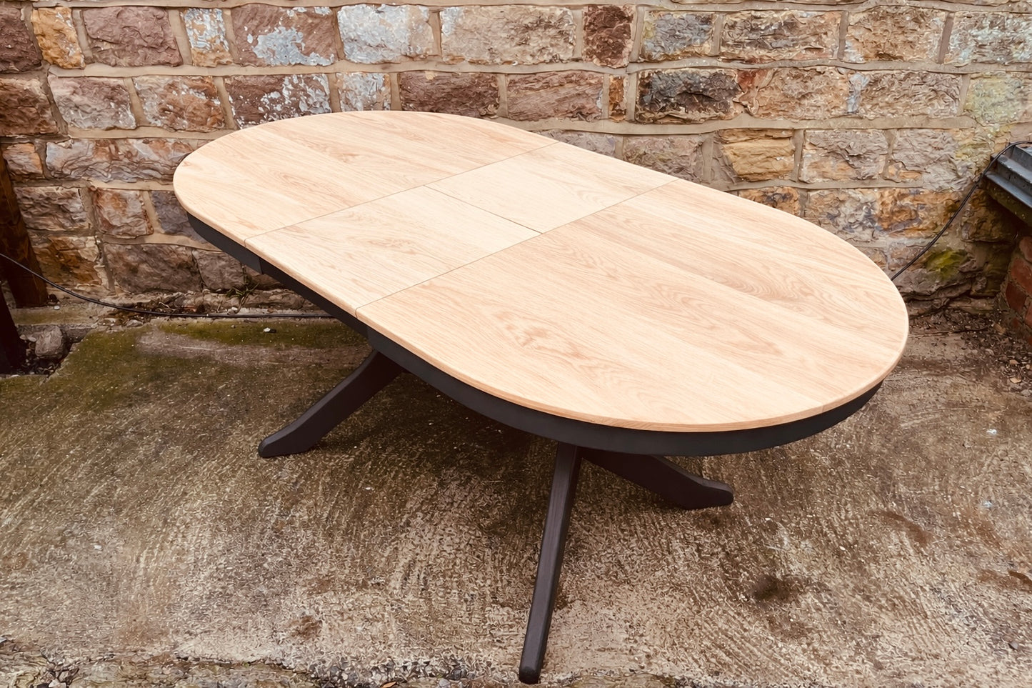 Solid Wood Extending Oval Dining Table with Dark Painted Base