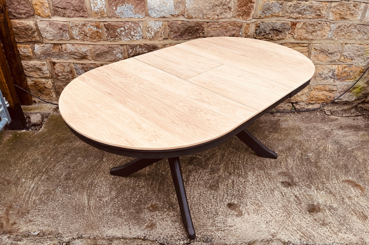 Solid Wood Extending Oval Dining Table with Dark Painted Base